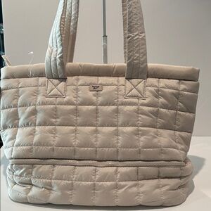Reebok Ellie Dual Compartment Nylon Tote with Suitcase Loop on the back.